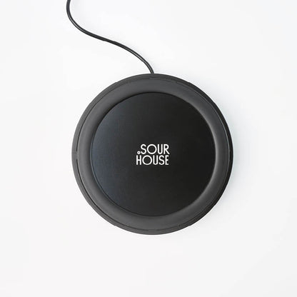 Overhead view of Goldie starter jar warmer warming base